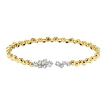 Load image into Gallery viewer, Gold bracelet with diamond accents on a white background