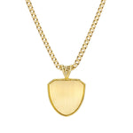 Load image into Gallery viewer, Gold necklace with a detailed shield-shaped pendant back on a white background