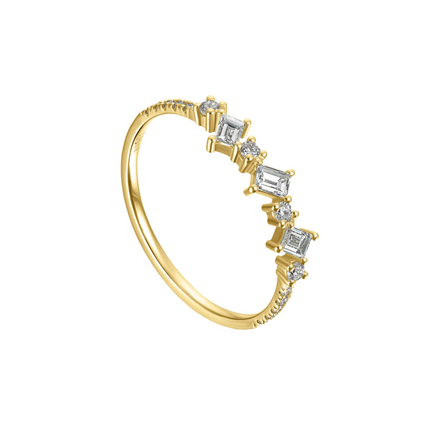 Gold ring with diamond accents on a white background