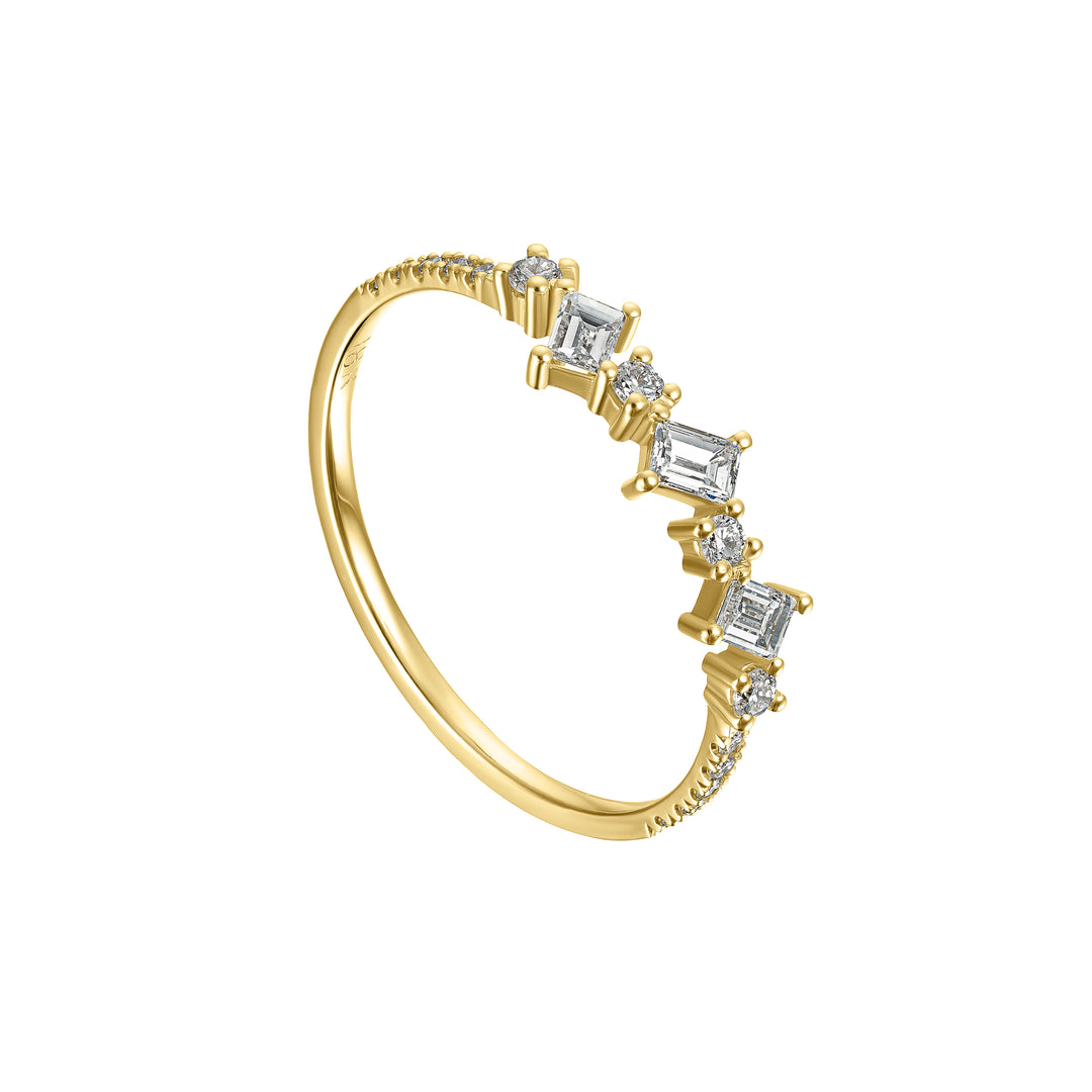 Gold ring with diamond accents on a white background