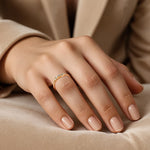 Load image into Gallery viewer, Gold ring with diamond accents on female model hand