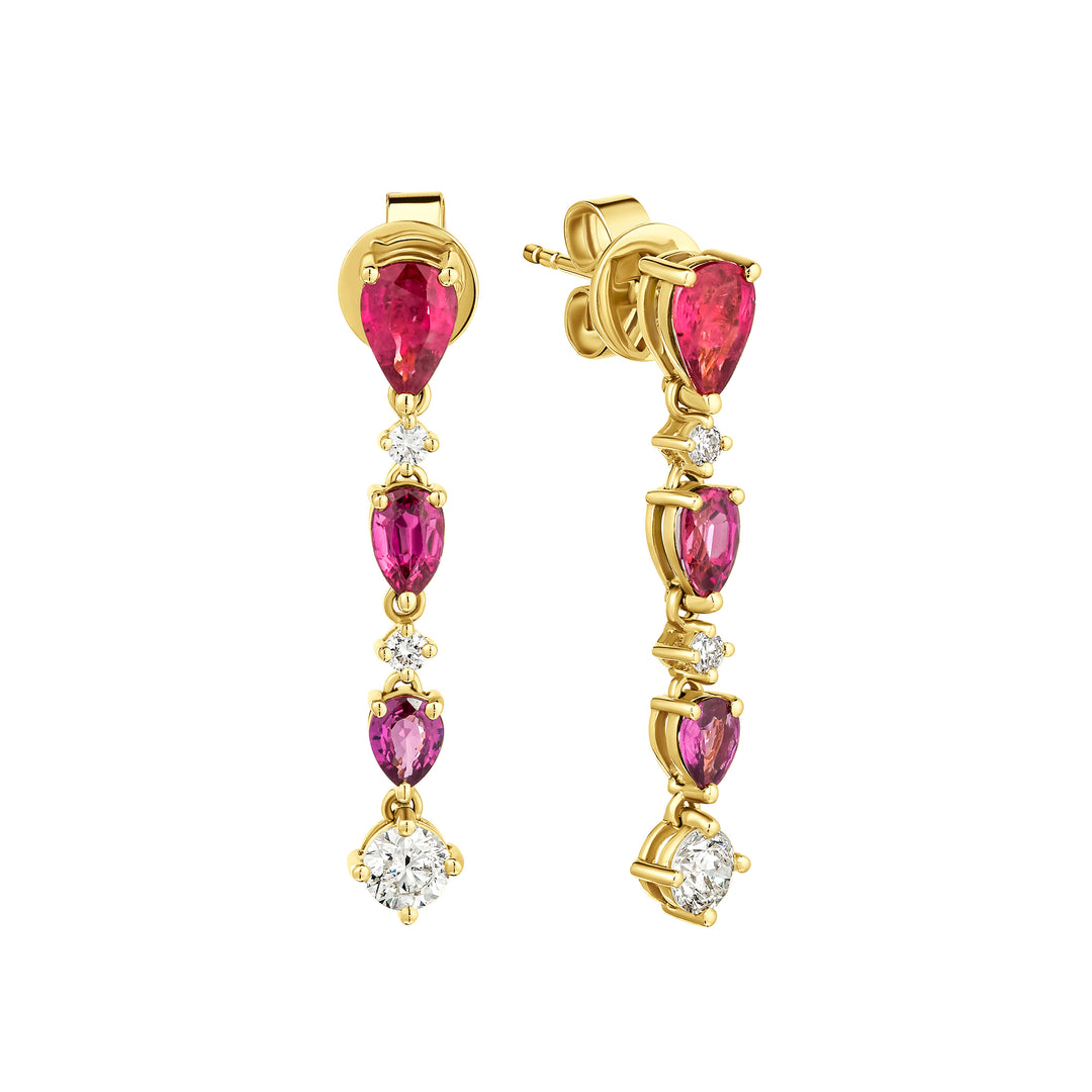 Gold earrings with pink gemstones on a white background