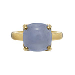 Load image into Gallery viewer, Gold ring with a blue gemstone on a white background