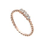 Load image into Gallery viewer, Rose gold ring with diamond accents on a white background