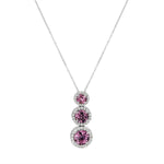 Load image into Gallery viewer, Necklace with three purple gemstones on a white background