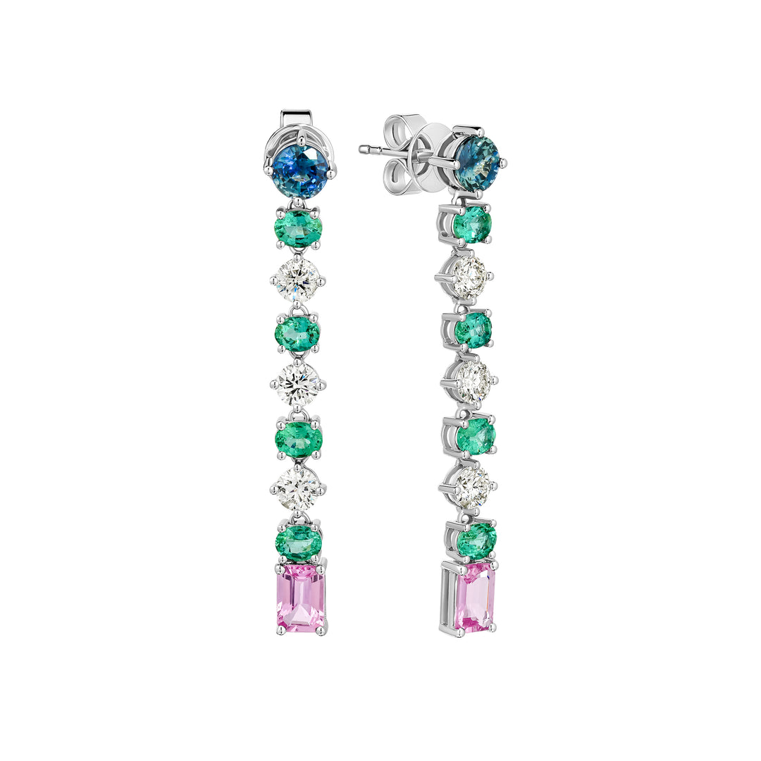 Pair of earrings with colored gemstones on a white background