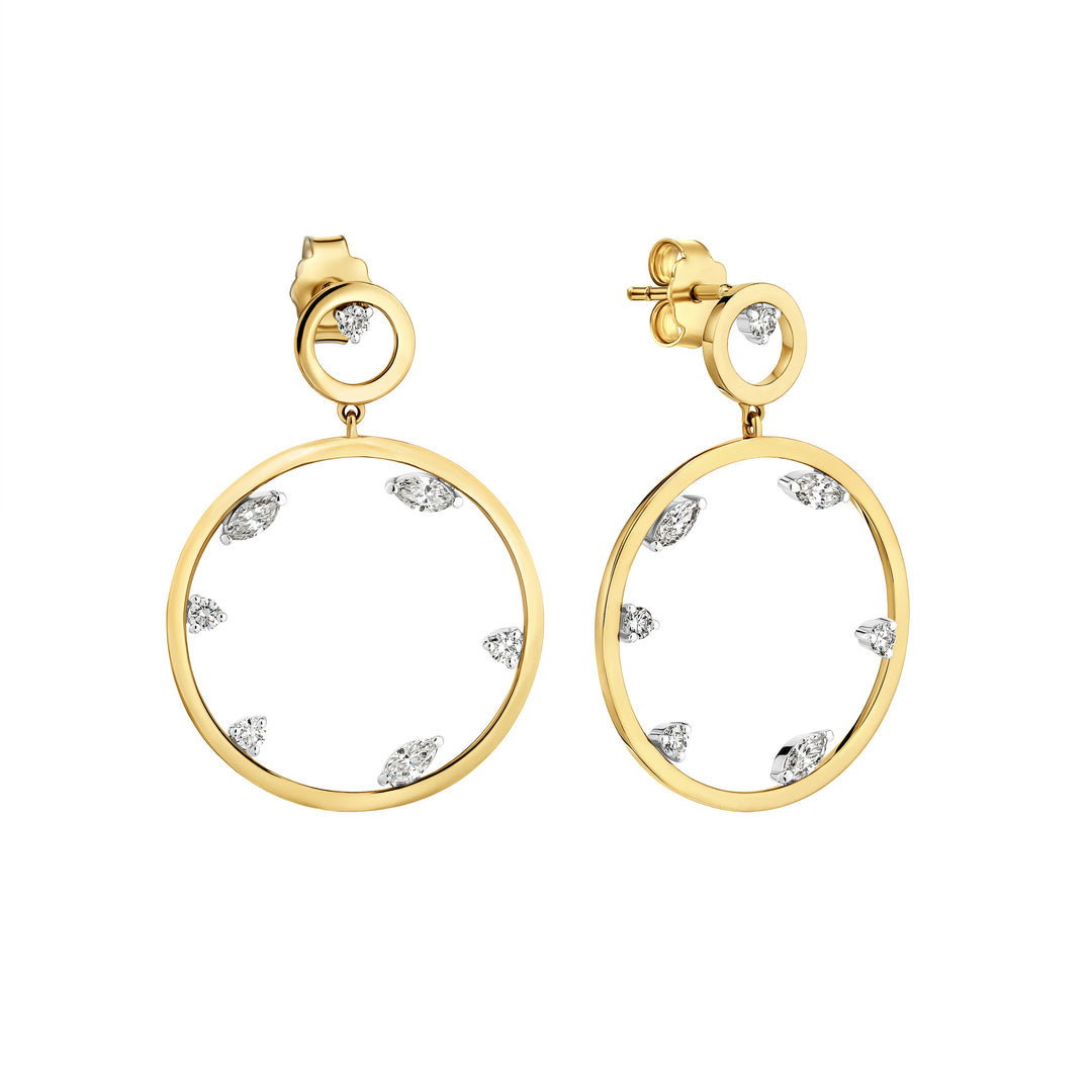 Gold hoop earrings with embedded diamonds on a white background
