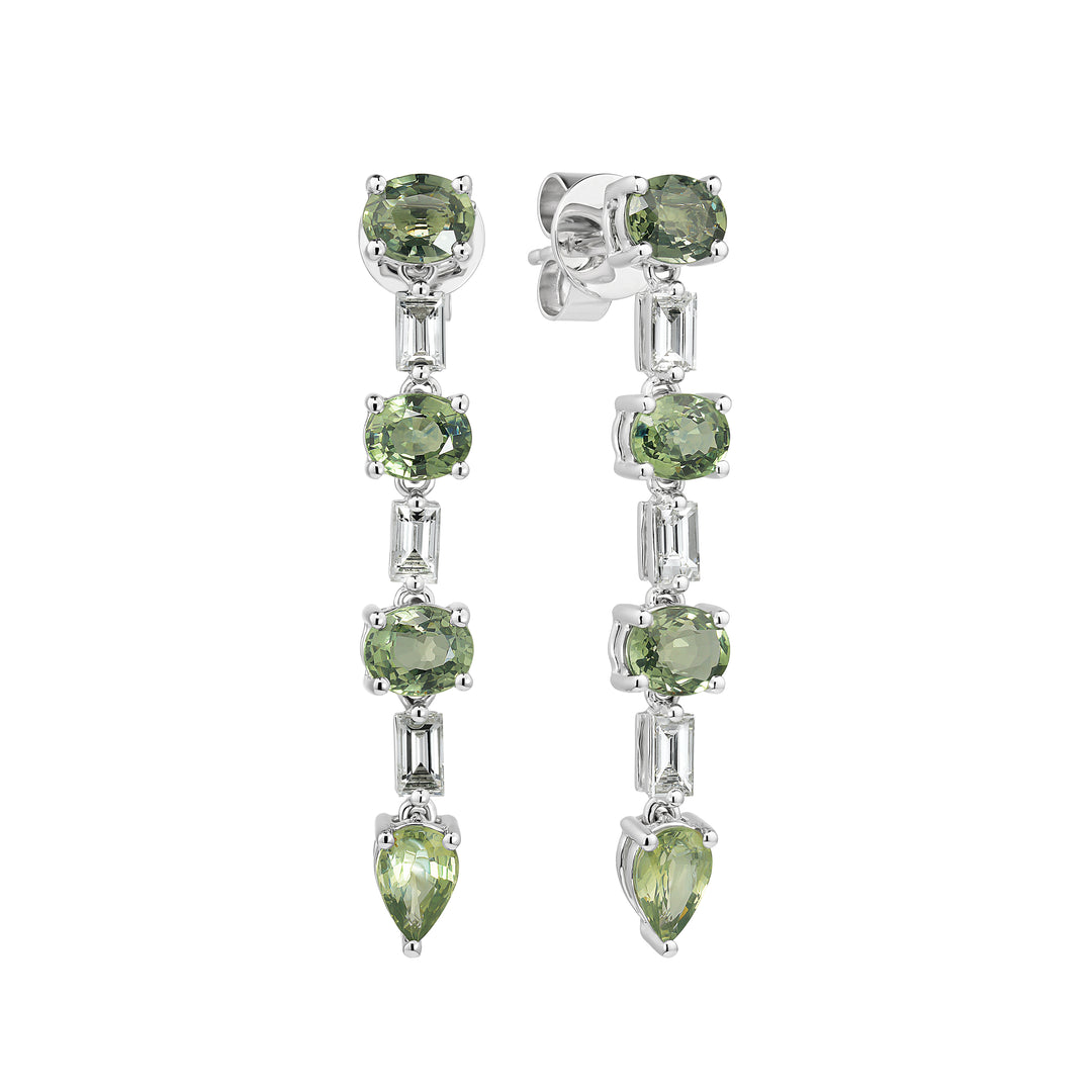 Pair of green gemstone earrings on a white background