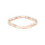 Load image into Gallery viewer, A rose gold band eternity ring with small inset stones around the entire circumference.