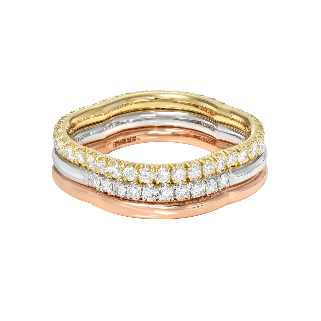 Yellow Gold, White Gold, and Rose Gold Diamond Rings Stacked on White Background