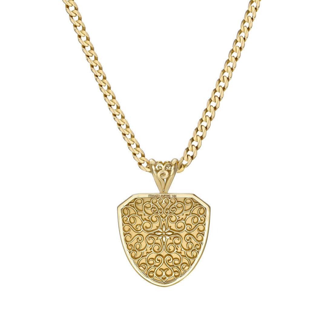 Gold necklace with a detailed shield-shaped pendant on a white background