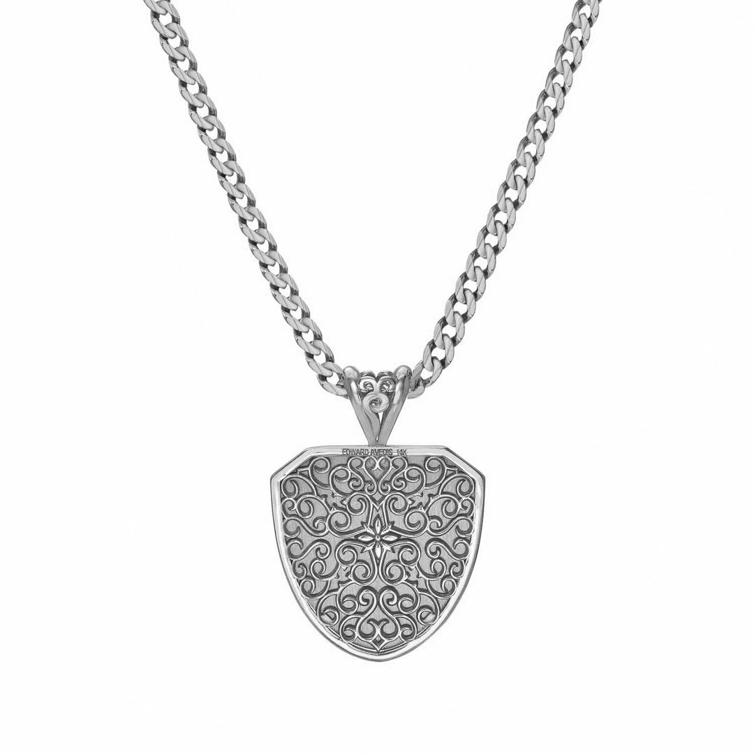 Sterling silver necklace with a detailed shield-shaped pendant on a white background