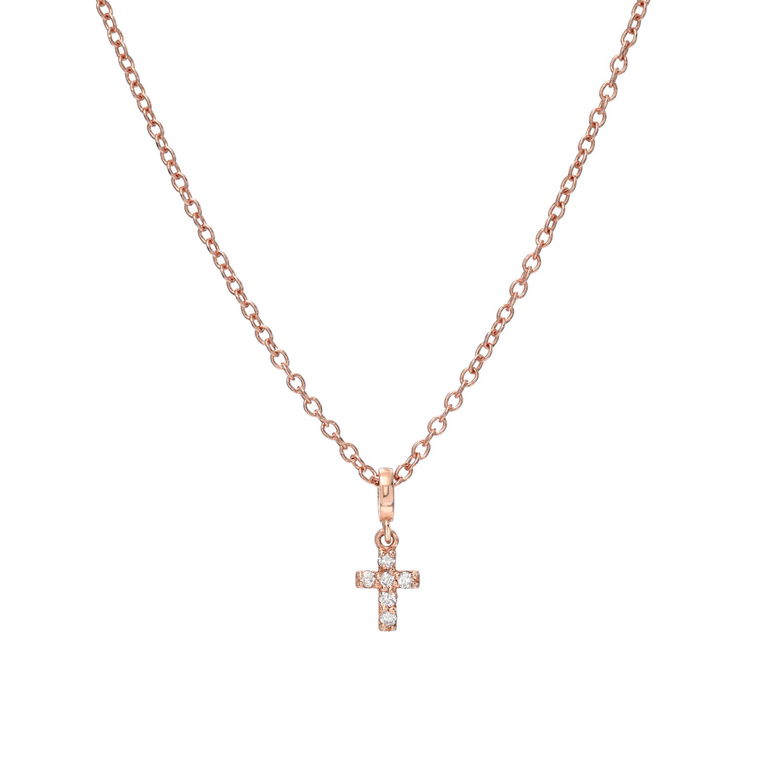 Mini Diamond Cross Charm Necklace in Rose Gold on White Background