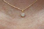 Load image into Gallery viewer, Gold necklace with a circle diamond pendant on a white background