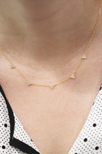 Load image into Gallery viewer, Triangle Pave Necklace in 14k Yellow Gold on Model