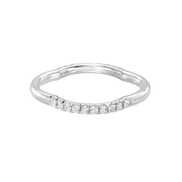 Gold ring with diamonds on a white background