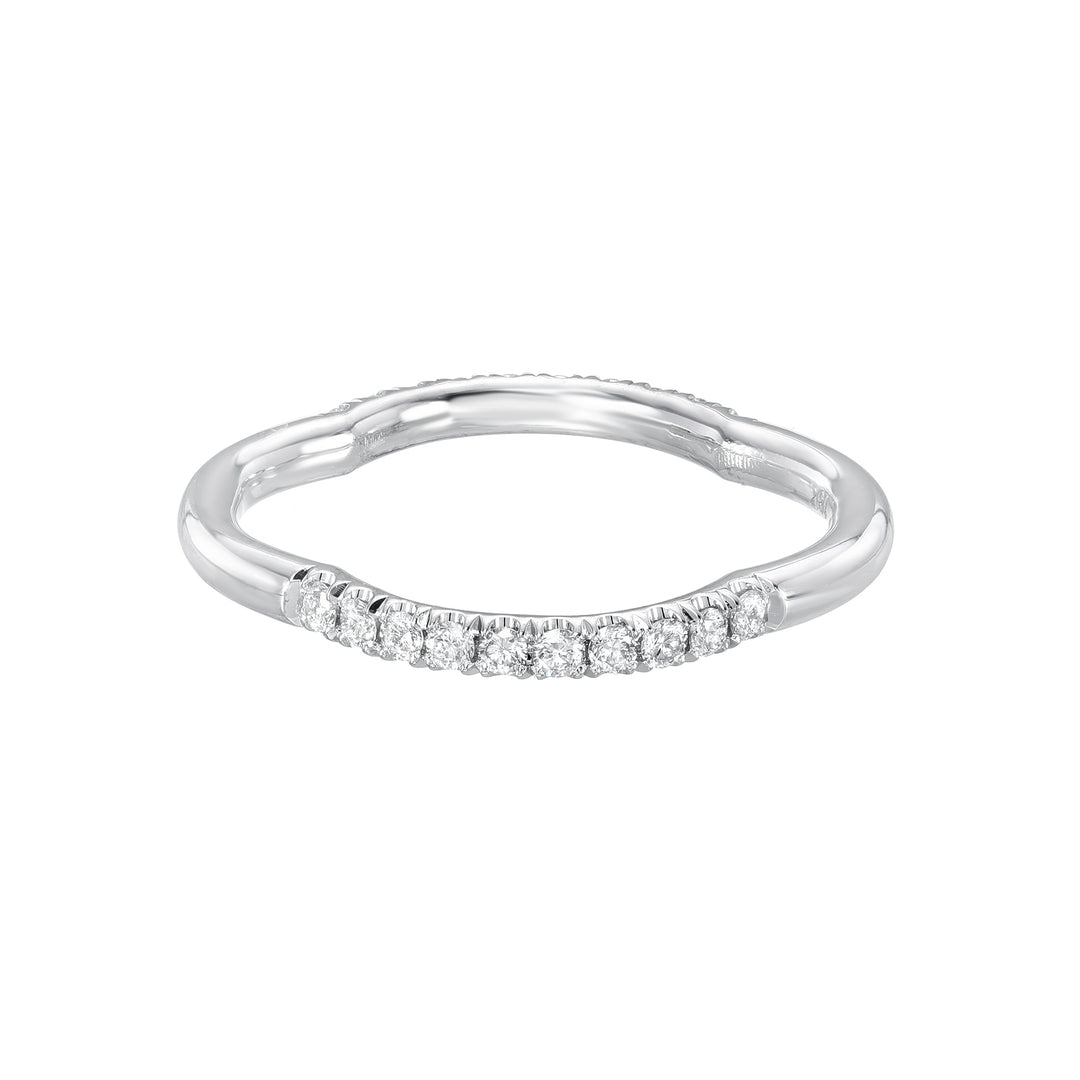 A white gold band eternity ring with small inset stones around the entire circumference.